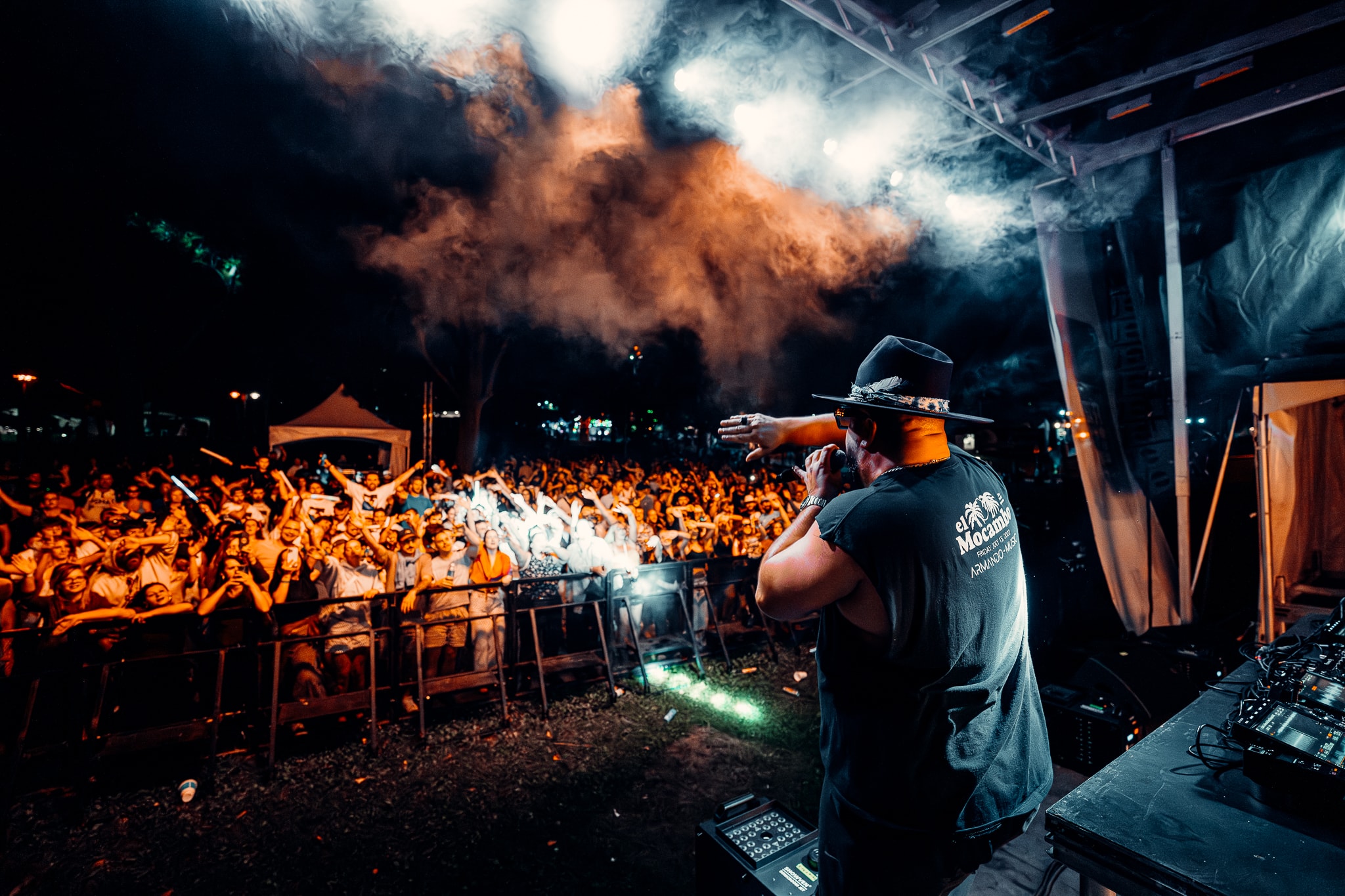 Armando performing live on stage — full cinematic shot